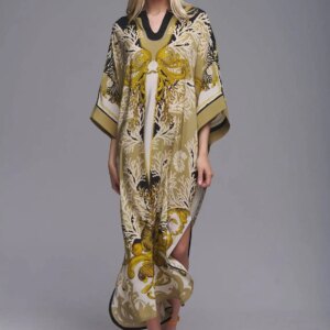 Woman styling a boho bliss beach maxi dress cover-up in solid navy, perfect for a versatile beach cover-up.