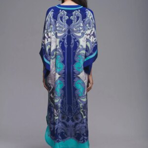 Back view of a model in a boho bliss beach maxi dress cover-up, paired with sandals for a chic summer look
