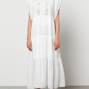 Model wearing a boho cotton maxi white dress with a flowy silhouette, front view