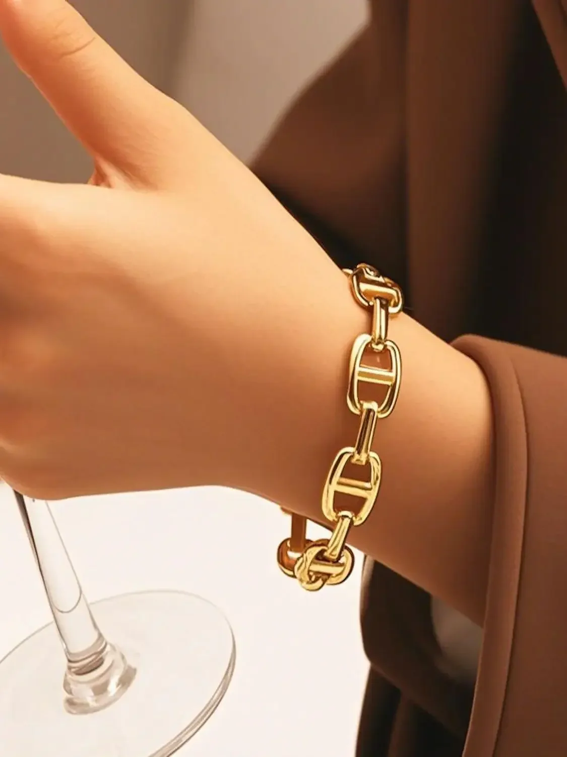 Titanium - Steel Gold - Plated C - Shaped Open - Ended Bangle. A Unique, Irregularly Spliced And Niche Accessory For Women. Titanium - Steel Gold - Plated C - Shaped Open - Ended Bangle. A Unique, Irregularly Spliced And Niche Accessory For Women.