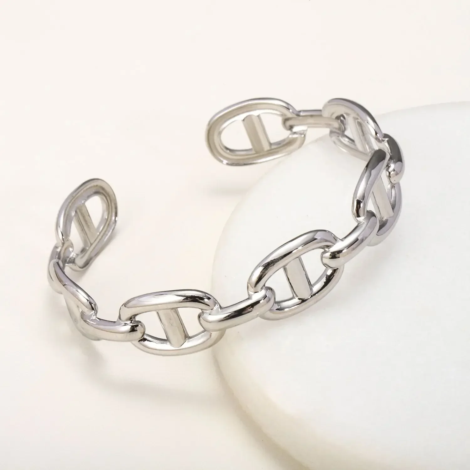 Titanium - Steel Gold - Plated C - Shaped Open - Ended Bangle. A Unique, Irregularly Spliced And Niche Accessory For Women. Titanium - Steel Gold - Plated C - Shaped Open - Ended Bangle. A Unique, Irregularly Spliced And Niche Accessory For Women.