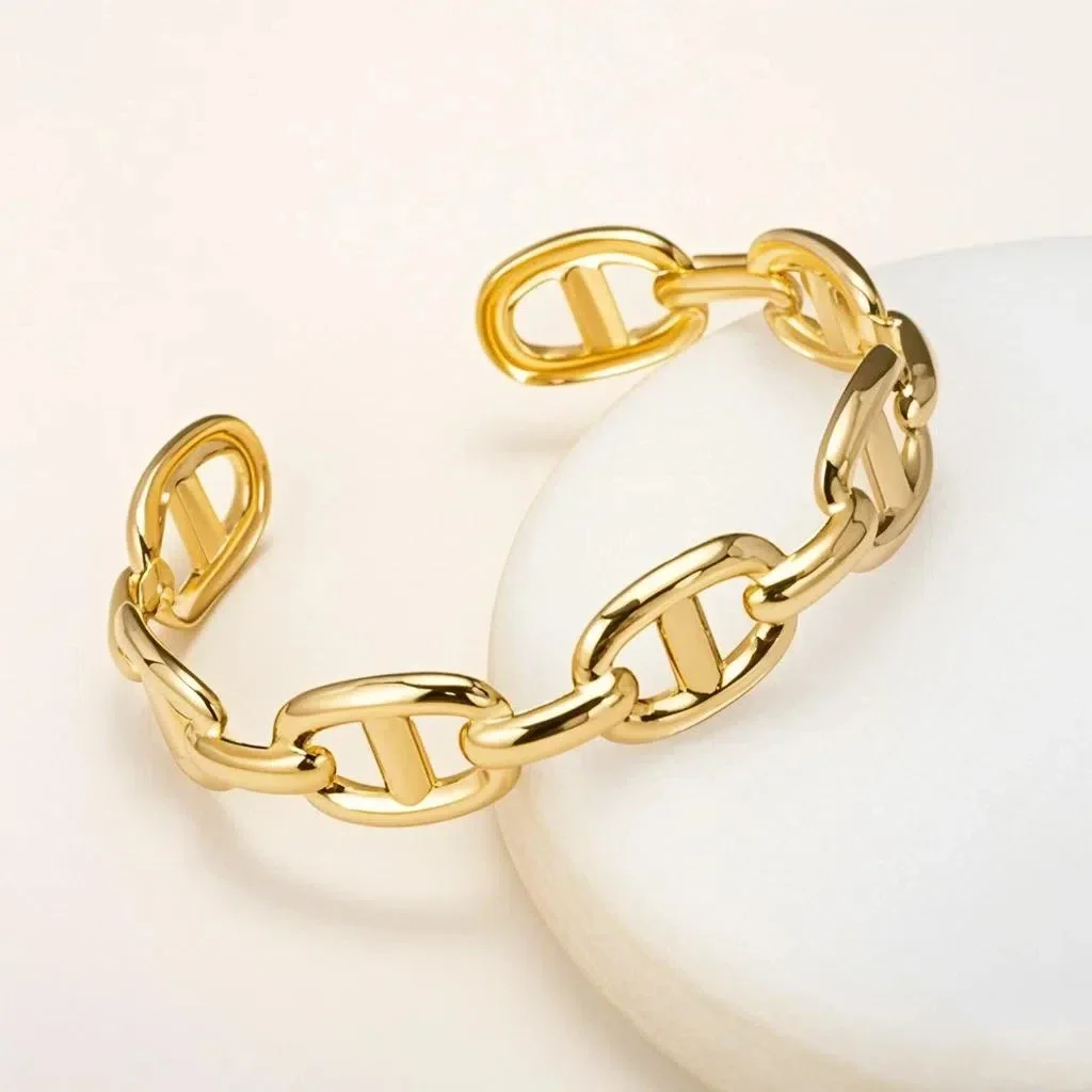 Titanium - Steel Gold - Plated C - Shaped Open - Ended Bangle. A Unique, Irregularly Spliced And Niche Accessory For Women. Titanium - Steel Gold - Plated C - Shaped Open - Ended Bangle. A Unique, Irregularly Spliced And Niche Accessory For Women.