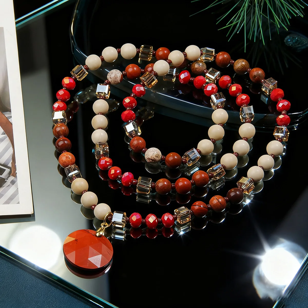 Bohemian style natural stone bead necklace with multiple sectional circular pendants suitable for daily wear and party wear